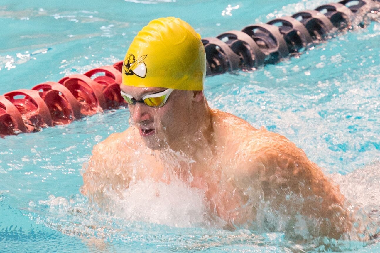 Terry swimming breaststroke in competition